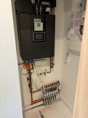 1st fix plumbing and heating_HIU cupboard designed and installed by the 1st fix team